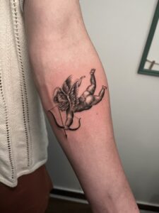 Tatuaggio angioletto Cupido